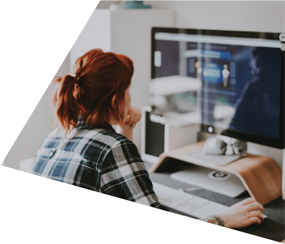 woman sat at computer